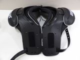 the back of a black football shoulder pad with a white and black logo on it