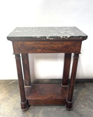 marble top end table on casteors