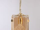 a close up of a light fixture hanging from a ceiling