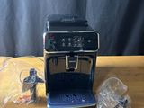 a coffee machine that is sitting on a wooden table