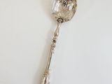a spoon that is sitting on a table