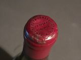 a bottle of wine that is sitting on a table