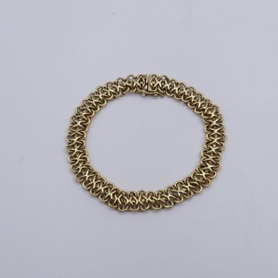 a gold chain bracelet with a clasp