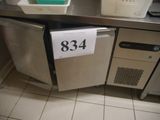 an image of a kitchen with a dishwasher and a refrigerator