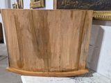a wooden planter sitting on top of a marble counter