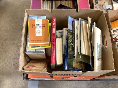 a box full of books sitting on a table