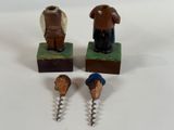 two wine openers and a bottle opener sitting on a table