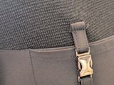 a close up of a person ' s pants with a metal buckle