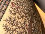 a picture of a decorative vase with a tree on it