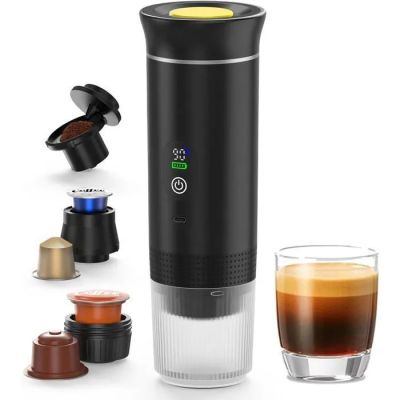 an image of a coffee maker with a cup of coffee next to it