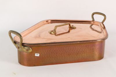 an image of a copper colored casserole with handles on a white background