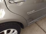a close up of a car door handle on the side of the car