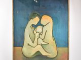 un tableau représentant deux personnes assises par terre