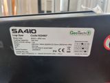 the back of a laptop computer with a sticker on it