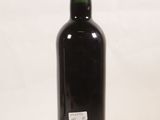 a bottle of wine that is sitting on a table