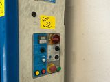 a machine that has a lot of buttons on it