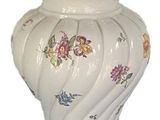 an image of a white and gold lamp with flowers on it