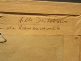 a piece of cardboard that has writing on it