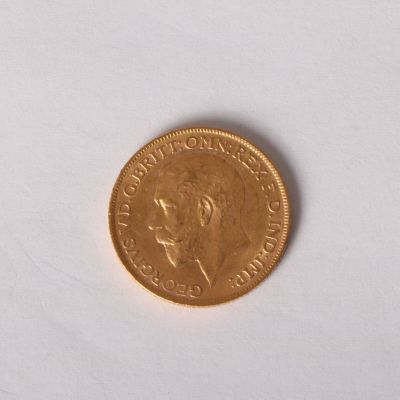 a gold coin with a picture of a man on it