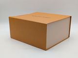 an image of a brown cardboard box on a white background