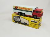 a toy truck that is sitting on top of a box