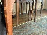 a wooden table with a drawer underneath it in a living room