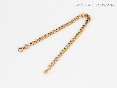 a close up of a chain on a white surface