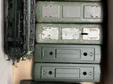 a box with a bunch of old electrical equipment in it
