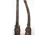 a pair of large bronze candlesticks in the form of a giraffe and a giraffe