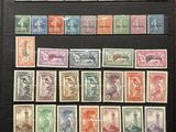 a collection of stamps from different countries on a book