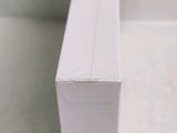 a close up of a white box on a table