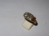 an image of a gold ring with a roman numeral on it