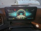 a car dashboard with a digital display on it
