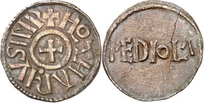 a close up of a coin on a white background