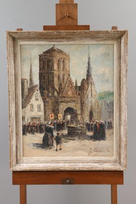 painting on easel of a street scene with a church in the background