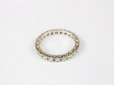 Alliance dite américaine en or gris sertie de diamants de ta…