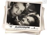une pile de vieilles photos d'un homme et d'une femme