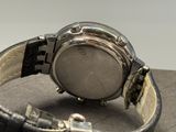 a close up of a wrist watch on a table