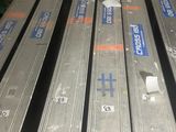 a lot of metal bars stacked on top of each other