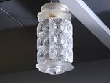 a light that is hanging from the ceiling in the room