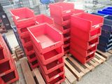 many red and blue crates stacked on a pallet