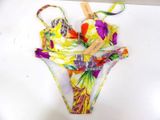 a bikini that has a colorful floral print on it