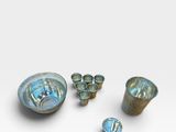 an image of a group of metal objects sitting on top of a white surface