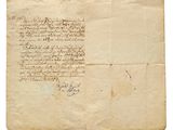 une feuille de papier sur laquelle on peut écrire, posée sur une table