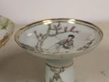 two bowls and a bowl on a table