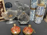 a lot of glass and metal items on a table
