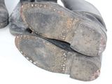 a close up of a pair of shoes on a white surface