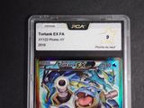 an image of a pokemon card in a plastic case