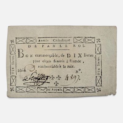 un gros plan d'un morceau de papier sur lequel on a écrit