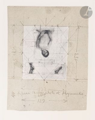 drawing of a man ' s head in a square on a piece of paper